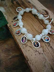 6668-0 White Glass Stretchable Bracelet with Medals.